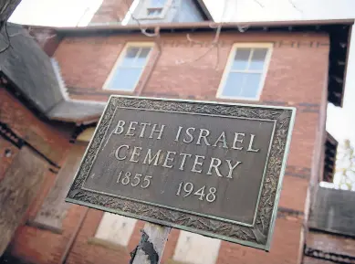  ?? MARK MIRKO PHOTOS/HARTFORD COURANT ?? A sign identifies the location of the 135-year-old Deborah Chapel at Beth Israel Cemetery in Hartford’s Frog Hollow neighborho­od.