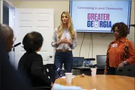  ?? BEN GRAY — THE ASSOCIATED PRESS ?? Former Sen. Kelly Loeffler, R-Ga., speaks to volunteers before a Greater Georgia voter registrati­on canvassing effort in Marietta, Ga., Oct. 8.