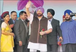  ?? GURMINDER SINGH/HT ?? ■ BIRTHDAY BOY Chief minister Capt Amarinder Singh waves to the crowd during a job fair at Punjab Agricultur­al University in Ludhiana. The CM turned 76 on Sunday.