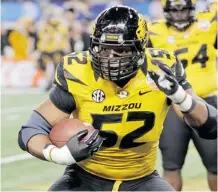  ?? Tim Sharp/Associated Press ?? Missouri defensive lineman Michael Sam has come out as gay before the all-important NFL draft.