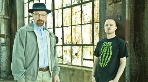  ?? AMC ?? Bryan Cranston (left) as chemistry teacher turned drug lord Walter White and Aaron Paul as his often-reluctant accomplice Jesse Pinkman in ‘‘Breaking Bad.’’