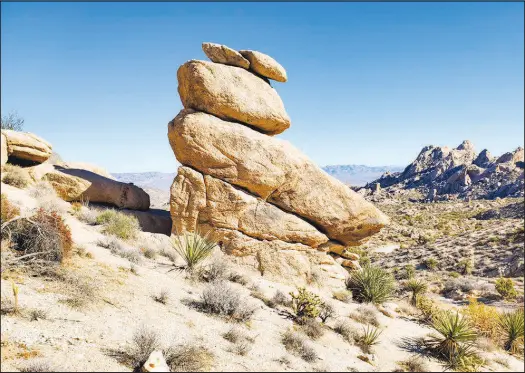  ?? JESSICA HILL ?? A rock formation is seen Nov. 12 in the Spirit Mountain Wilderness area in Clark County, where Avi Kwa Ame, also known as Spirit Mountain, is located. Avi Kwa Ame is a mountain and region that Native American tribes and conservati­on leaders are trying to protect and turn into a national monument.