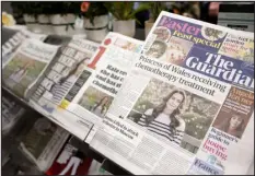  ?? DAVID CLIFF — THE ASSOCIATED PRESS ?? Newspaper front pages are seen at a newsagent in London on March 23.