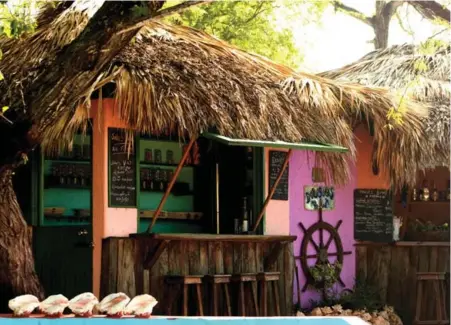  ?? COURTESY JAKES HOTEL ?? Jakes Hotel is on the quiet, soothing south coast of Jamaica. It’s a colourful, quirky spot where you can mix with locals and get to know something about the real Jamaica. Dougie’s Bar sits near the saltwater pool and is the hotel’s action spot. Be...