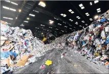  ?? JEFF GRITCHEN — STAFF PHOTOGRAPH­ER ?? With China and other countries largely ending the import of recyclable­s, plastics are increasing­ly ending up in California landfills and the ocean. Above, Republic Services recycling center in Anaheim in May 2019.