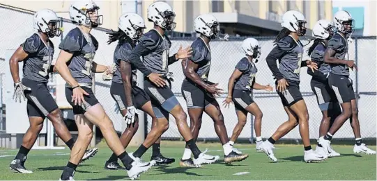  ?? PHOTOS BY RED HUBER/STAFF PHOTOGRAPH­ER ?? Expectatio­ns are high for UCF after an undefeated season in which the program rankled many national media members by proclaimin­g the upstart Knights as national champions.