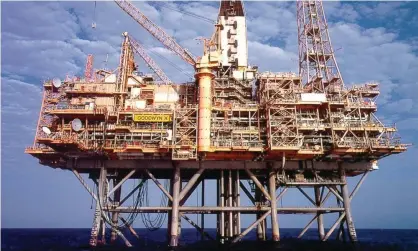  ??  ?? File photo of Woodside Petroleum’s Goodyn A platform in the North West Shelf. BHP has agreed to merge its $20bn worth of oil and gas assets into Woodside. Photograph: EPA