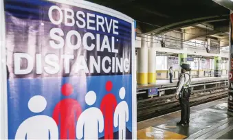  ??  ?? SOCIAL DISTANCING – Visual cues on walls and posts and lines on the floor have been taped in strategic areas of the MRT-North Avenue station in Quezon City as it prepares to enforce the social distancing rule on commuters when operations go back to normal. (Alvin Kasiban)