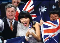  ?? (Maja Suslin/TT News Agency/Reuters) ?? AUSTRALIA’S DAMI IM cheers in the Green Room during the Eurovision Song Contest final in Stockholm on May 14.