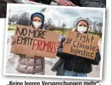  ??  ?? „Keine leeren Versprechu­ngen mehr“, fordern diese Protestler in München.