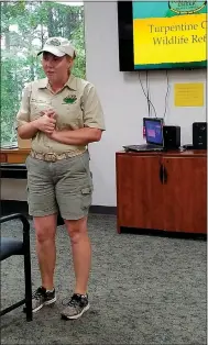  ?? Photo submitted ?? Hannah, an interprete­r from Turpentine Creek Wildlife Refuge, gave a fascinatin­g program to adult patrons last Monday at the library.