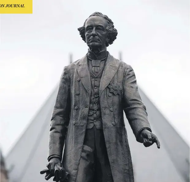 ?? LAURA PEDERSEN/NATIONAL POST ?? This statue of Sir John A. Macdonald, the latest historical figure mired in controvers­y, sits at the foot of the Ontario Legislatur­e in Toronto.