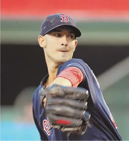  ?? aP PHOtO ?? START OF SOMETHING BIG: Red Sox starter Rick Porcello delivers to the plate en route to his complete game victory in last night's 6-2 win over the Angels in Anaheim, Calif. Porcello moved to 14-2 on the year.