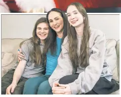  ?? ?? GIFT RIFT: East Village mom Rhonda Malkin compromise­d on high-end gifts with her daughters Talia, 12, and Annie, 15 — getting Annie a $100 jacket but not $150 Ugg boots or a $600 hair dryer.