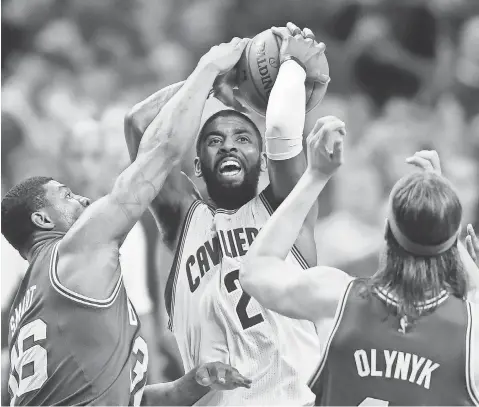  ?? KEN BLAZE, USA TODAY SPORTS ?? Kyrie Irving, center, scored 42 points and had four assists and three rebounds in the Game 4 win against the Celtics on Tuesday.