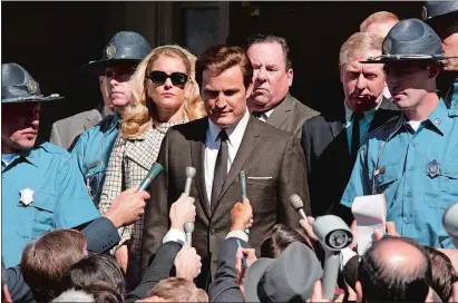  ??  ?? Jason Clarke stars as Ted Kennedy, center, and Andria Blackman stars as Joan Kennedy, in a scene from “Chappaquid­dick.”