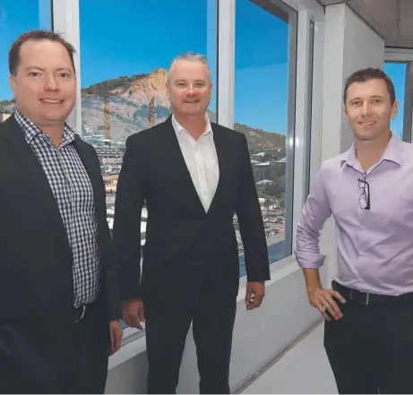  ?? ?? Derek Campbell, Steve Abbott and Todd Walsh in KPMG'S new Townsville office in the Suncorp tower in Sturt St.