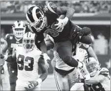  ?? AP PHOTO ?? Los Angeles Rams’ running back Todd Gurley’s (36) revitaliza­tion has turned him into one of the NFL’s most productive running backs.