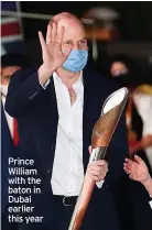  ?? ?? Prince William with the baton in Dubai earlier this year