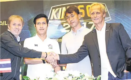  ??  ?? Thailand coach Milovan Rajevac, left, shakes hands with his North Korea counterpar­t Jorn Andersen while defender Chalermpon­g Kerdkaew, second left, greets goalkeeper Ri Myong-Guk during a press conference yesterday.