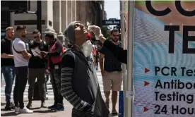  ?? Photograph: Justin Lane/EPA ?? A person receives a Covid-19 test swab on the street in New York on 26 May 2022.