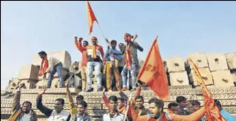  ?? REUTERS ?? Supporters of the Vishva Hindu Parishad shout slogans after attending the Dharma Sabha in Ayodhya on Sunday.