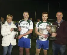  ??  ?? Moira Mann presents the Culleton Cup to joint captain Ian Bracken and joint captain Jack Hamilton receives the Carter Cup from Wicklow GAA Vice-Chairman Martin Fitzgerald. Photos: Garry O’Neill