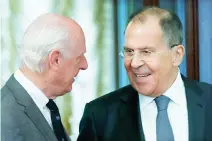  ??  ?? UN Special Envoy for Syria Staffan de Mistura, left, and Russian Foreign Minister Sergey Lavrov talk to each other during their meeting in Moscow, last Thursday. (AP)