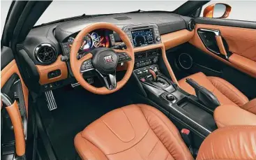  ??  ?? The 2017 edition of Nissan’s flagship performanc­e car, the GT-R, benefits from an overhauled, upscaled cabin design.