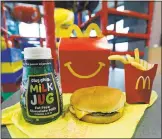  ?? ROGELIO V. SOLIS— ASSOCIATED PRESS ?? Customers can still ask specifical­ly for cheeseburg­ers or chocolate milkwith their HappyMeals even though the items won’t be listed as menu options.