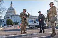  ?? J. SCOTT APPLEWHITE/ASSOCIATED PRESS ?? Heightened security remains around the U.S. Capitol on Wednesday following the Jan. 6 attacks by a mob of supporters of then-President Donald Trump.