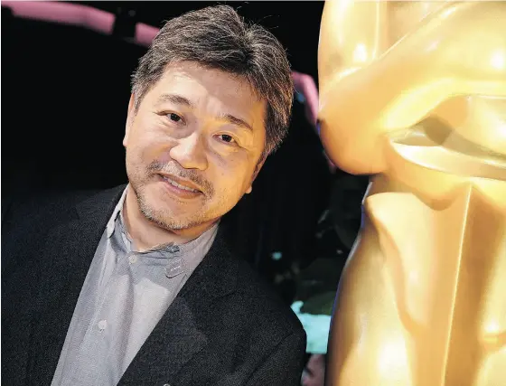  ?? ROBYN BECK / AFP / GETTY IMAGES ?? Japanese film director Hirokazu Kore-eda at an Oscars luncheon last week. Kore-eda’s Shoplifter­s is up for best foreign language film at the Oscars, won the Palme d’Or at the Cannes Film Festival in May and has been a box office hit in Japan.