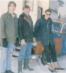  ??  ?? Boyd, his sons, and the so-called “Old Plymouth.”