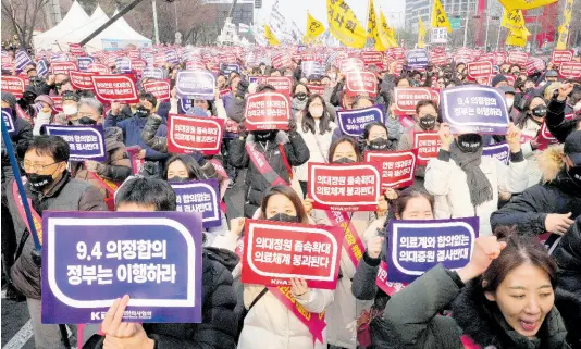  ?? AP ?? Doctors stage a rally against the government’s medical policy in Seoul, South Korea, on Sunday, March 3.