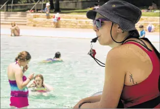  ?? JAY JANNER / AMERICAN-STATESMAN 2014 ?? The city of Austin hopes to have enough lifeguards on duty this summer. The Austin Parks Foundation is offering a $100 bonus to new hires who complete training and a first week.