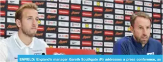  ??  ?? ENFIELD: England’s manager Gareth Southgate (R) addresses a press conference, as England’s Harry Kane looks on at the Tottenham Hotspur Training Ground in Enfield. —AFP