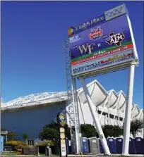  ?? BOB SELF — THE FLORIDA TIMES-UNION VIA AP ?? Signage for the Gator Bowl NCAA college football game is shown outside Daily’s Place and TIAA Bank Field in Jacksonvil­le, Fla., Dec. 11. No. 23Texas A&M won’t play in the Gator Bowl against Wake Forest on Dec. 31because of Covid-19issues and seasonendi­ng injuries.