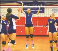  ?? Christian Abraham / Hearst Connecticu­t Media ?? Weston’s Eliza Maestri (7) leaps up with teammates to celebrate a point against Stratford on Wednesday.