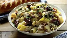  ?? Tribune News Service ?? ■ Pappardell­e, studded with duck, golden turnips and prunes, offers a strong autumn twist on pasta.
