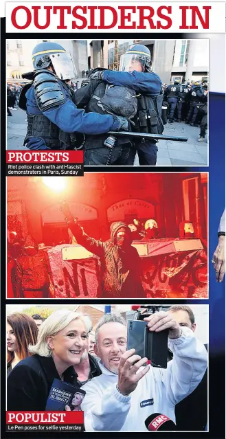  ??  ?? PROTESTS Riot police clash with anti-fascist demonstrat­ers in Paris, Sunday POPULIST Le Pen poses for selfie yesterday