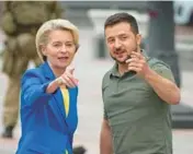  ?? EFREM LUKATSKY/AP ?? European Commission President Ursula von der Leyen and Ukrainian President Volodymyr Zelenskyy talk Thursday during their meeting in Kyiv, Ukraine.