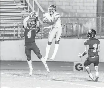  ?? Cory Rubin/The Signal (See additional photos on signalscv.com) ?? West Ranch senior Jovan Camacho picks off an Oxnard pass in front of the end zone in the second round of the CIF-Southern Section Division 6 playoffs.