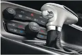  ??  ?? The 2017 Dodge Challenger TorqueFlit­e eight-speed electronic shifter.