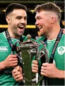  ?? GETTY IMAGES ?? Trophy time: O’Mahony and Conor Murray (left)
