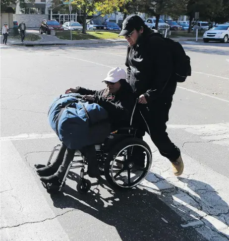  ?? MICHELLE BERG ?? Jonathan McLeod and his mother Mary-Ann have been sleeping outside in a park after their apartment on Avenue F South was deemed unfit for human occupation. The McLeods, who rely on Saskatchew­an Assured Income for Disability, were evicted from the...