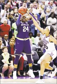  ?? Andy Lyons / Getty Images ?? Arike Ogunbowale hits the game-winning shot with 0.1 seconds remaining in the fourth quarter to lift Notre Dame to a 61-58 win over Mississipp­i State in the 2018 NCAA women’s title game.