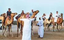  ?? Courtesy: Hamdan Bin Mohammad Heritage Centre ?? A group of participan­ts training at the HHC camel farm in Al Nakhra, located off Dubai-Al Ain road.