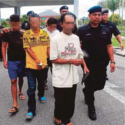  ?? BERNAMA PIC ?? The four accused were sentenced to between 25 and 55 years’ jail and 24 strokes of the rotan by the Sessions Court in Kota Samarahan last Friday.
