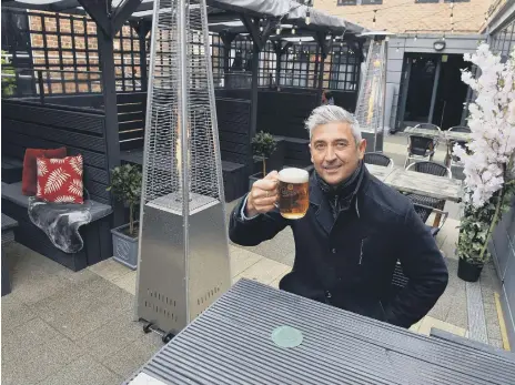  ??  ?? The new Courtyard outdoor space at The Looking Glass with owner Harry Collinson.