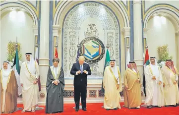  ??  ?? Trump (fourth left) prepares for a family photo with Saudi Arabia’s King Salman (fourth right) and heads of state at the Gulf Cooperatio­n Council leaders summit in Riyadh. — Reuters photo